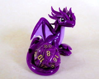 Illustration for article titled Adorable sculpted dragons guard your 20-sided dice